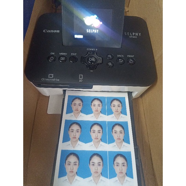 Máy in ảnh thẻ du lịch mini cằm tay Canon SELPHY CP1000