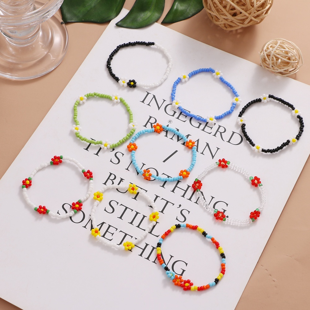 Vòng tay co giãn gắn hạt hoa cúc nhiều màu đáng yêu hợp thời trang cho nữ