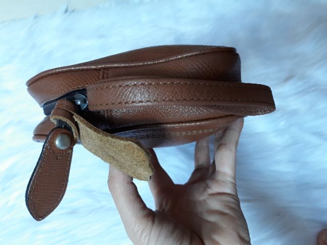 Túi cầm tay da thật