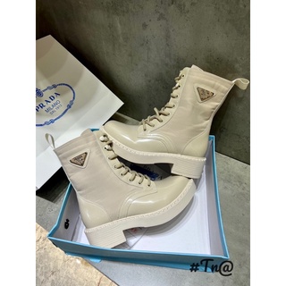 Boot da prada đan dây mai phương bùi