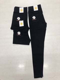 Quần legging in hoa cúc vàng