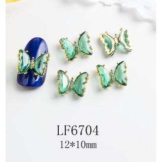 Charm bướm đá trong