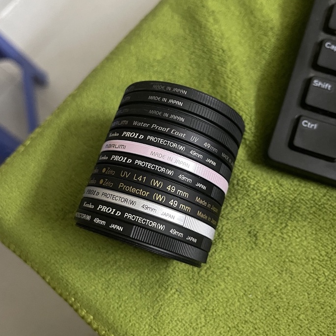Filter Kính lọc 49mm, 40.5mm cho ống kính máy ảnh Nội địa Nhật 98 99%