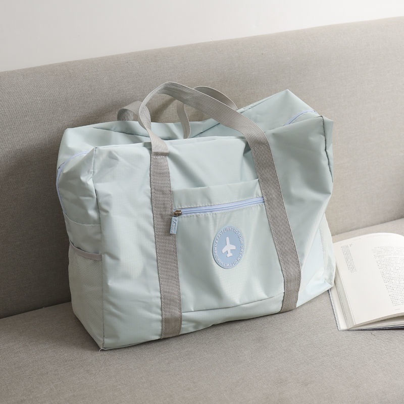 Travel bag handbag Korean version of short-distance folding trolley ready-to-produce bag large-capacity portable duffel