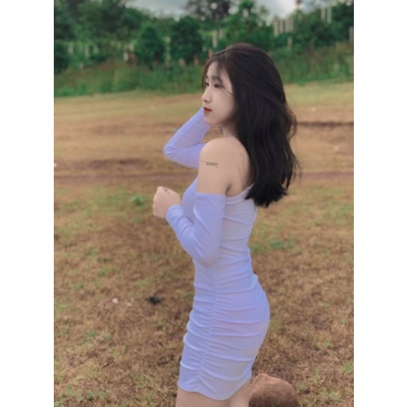 Đầm body khoét eo tay dài