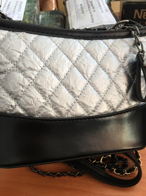 Túi đeo pha màu,da dập