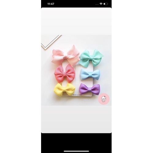 kẹp nơ cho chó mèo