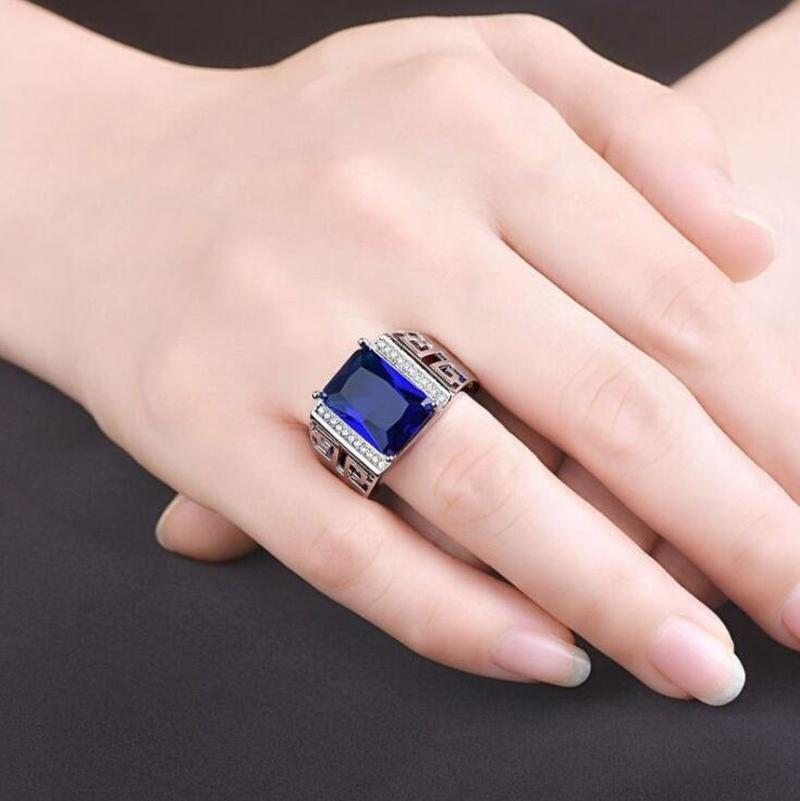 Nhẫn bạc S925 thép titan đính kim cương sapphire xanh lam thanh lịch