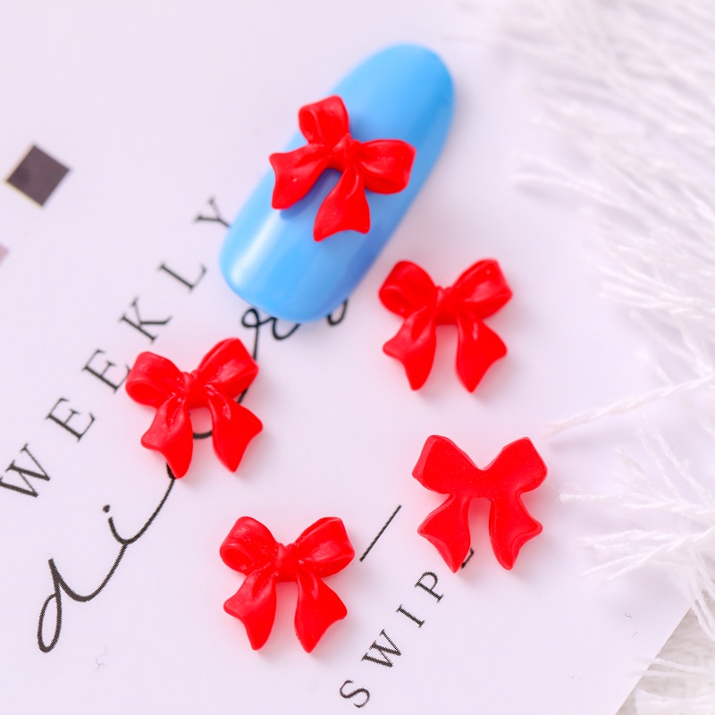 Set 2 phụ kiện nơ màu trơn đính móng tay xinh xắn cho nữ
