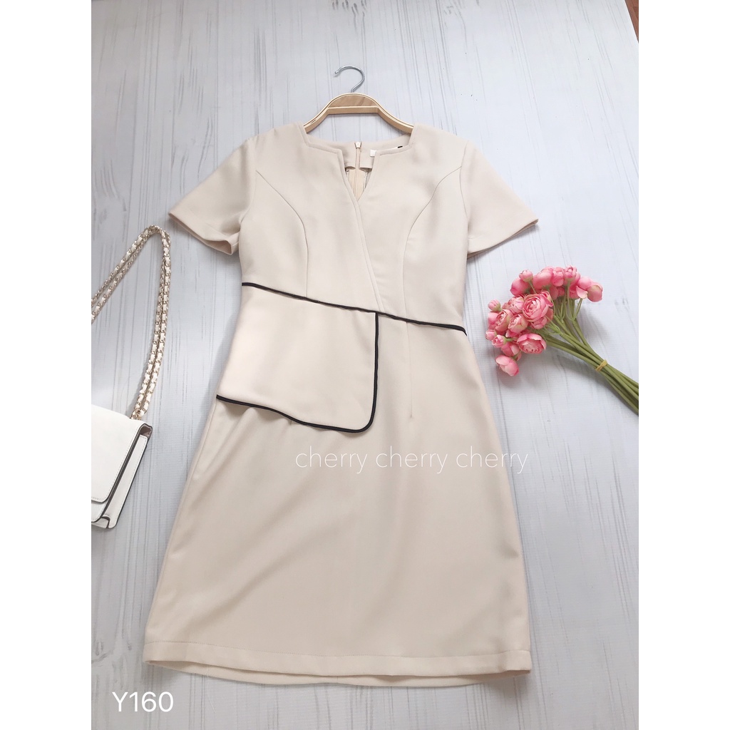 Váy văn phòng cổ V vạt eo tôn giáng tự tin