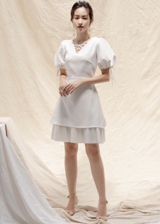 Đầm trắng đan ngực
