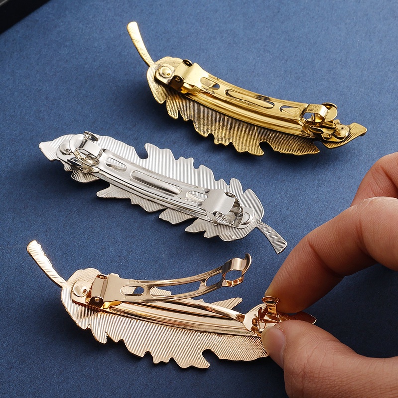 Kẹp Tóc Hình Lông Vũ Bằng Kim Loại Phong Cách Vintage Thanh Lịch Cho Nữ