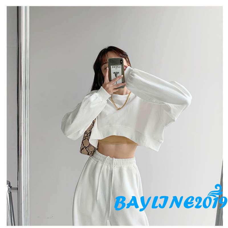 Áo thun dài tay hở rốn cổ tròn màu trơn thời trang năng động cho nữ