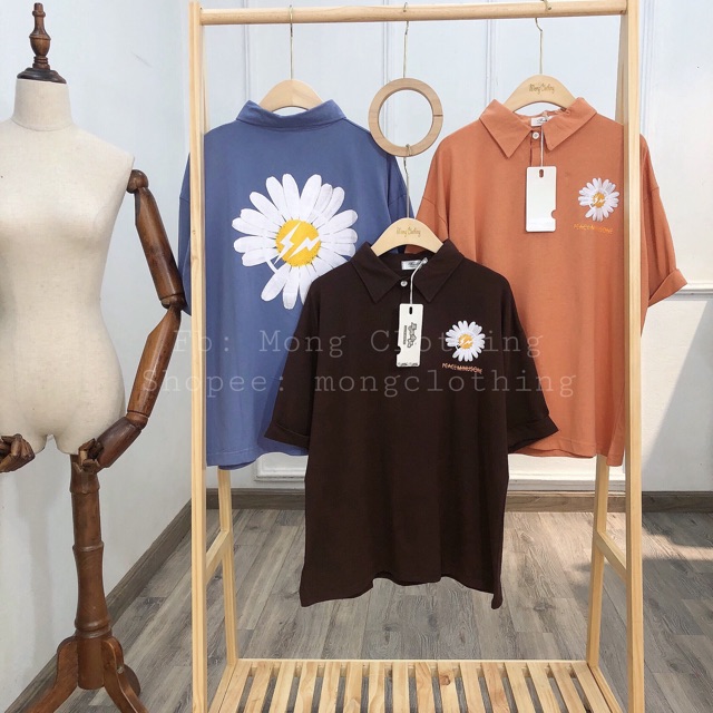 Áo polo hoa cúc nam nữ đều mặc được. | BigBuy360 - bigbuy360.vn