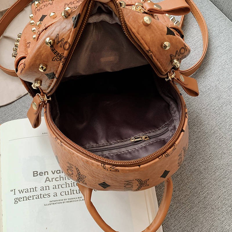 Đinh tán Mini Shoulder Bag Nữ 2020 Phiên bản tiếng Hàn mới của hàng trăm ba lô nhỏ Túi du lịch đa túi QI cao cấp