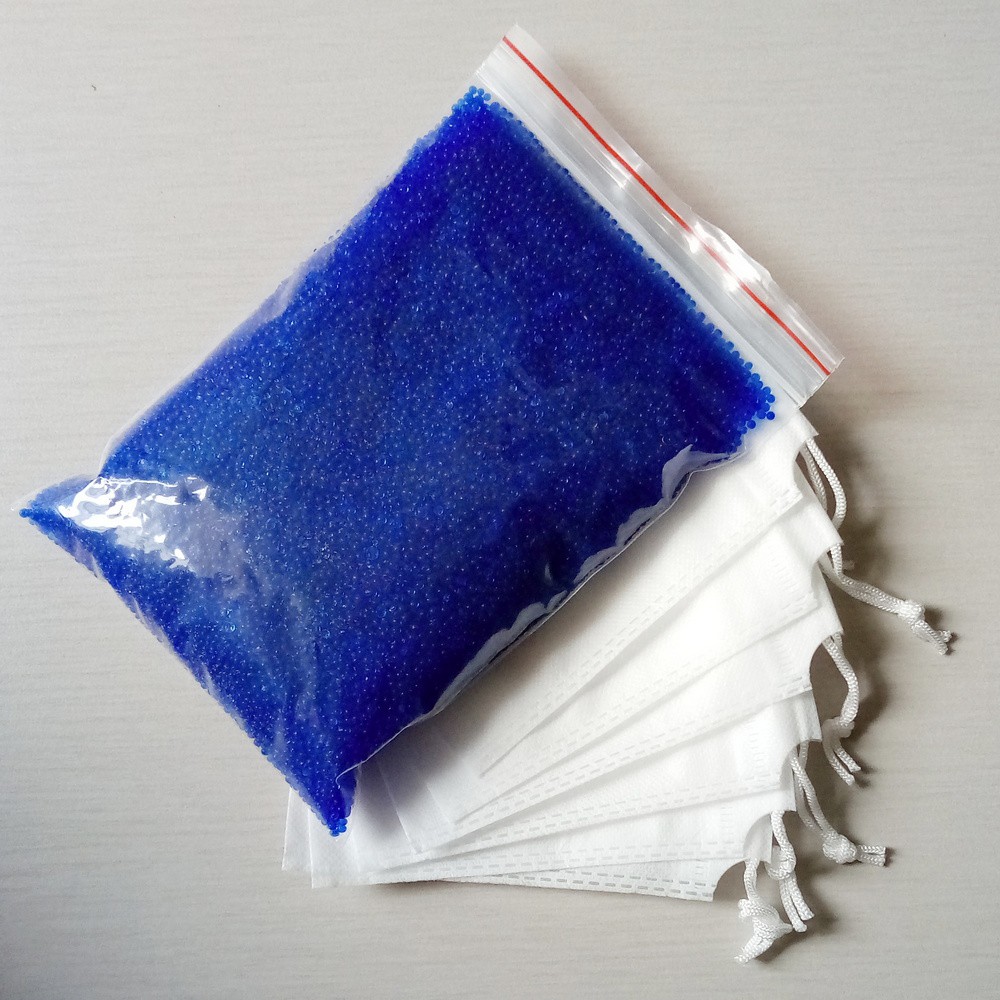 Hạt hút ẩm gói 1kg kèm 6 túi vải không dệt