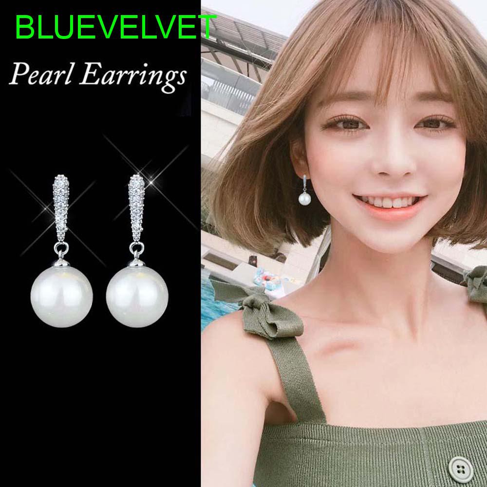 Bông tai kim loại đính hạt ngọc trai xinh xắn