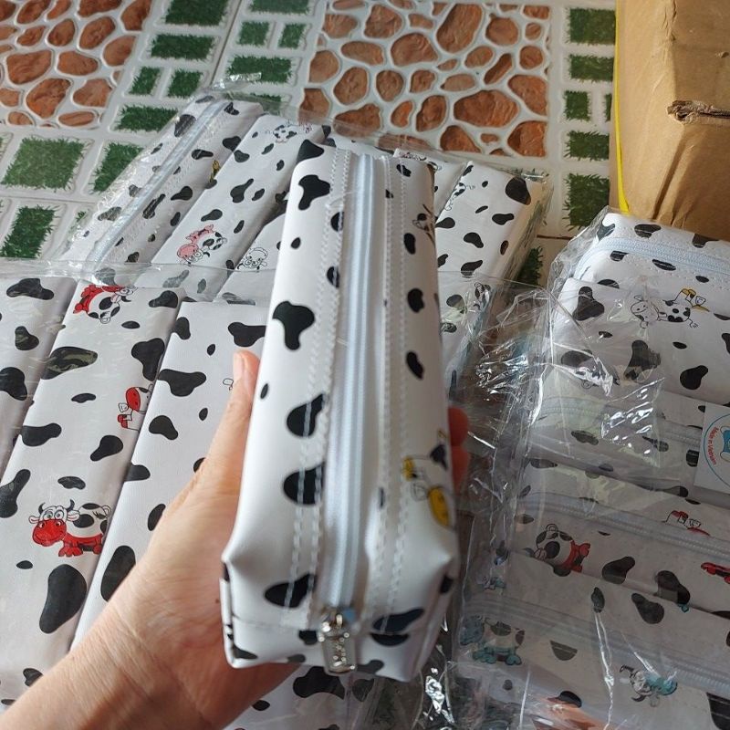 Bóp nhựa bò sữa