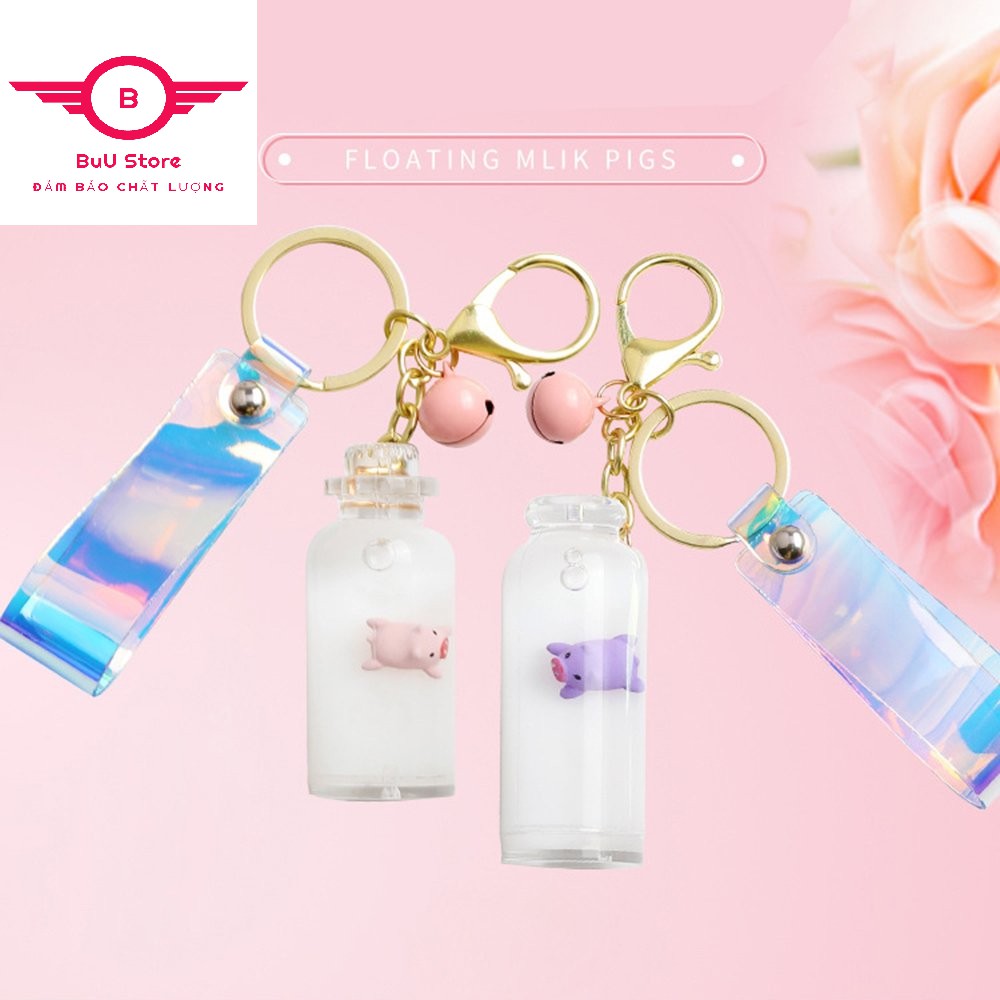 Móc chìa khóa hình chú heo con nổ trên lọ thủy tinh chứa nước lỏng trang trí xinh xắn đáng yêu