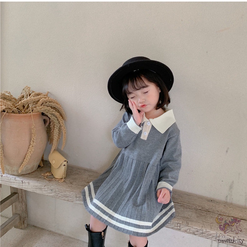 Đầm dài tay phối bèo nhún cho bé