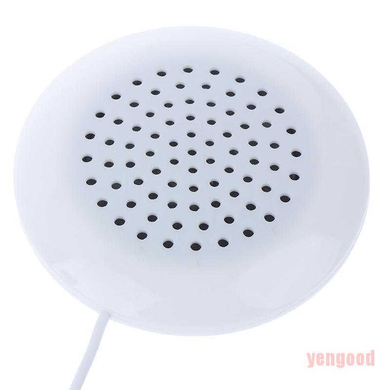 Loa nghe nhạc kết nối MP3 jack cắm 3.5mm màu trắng đặt bên cạnh gối nằm tiện dụng