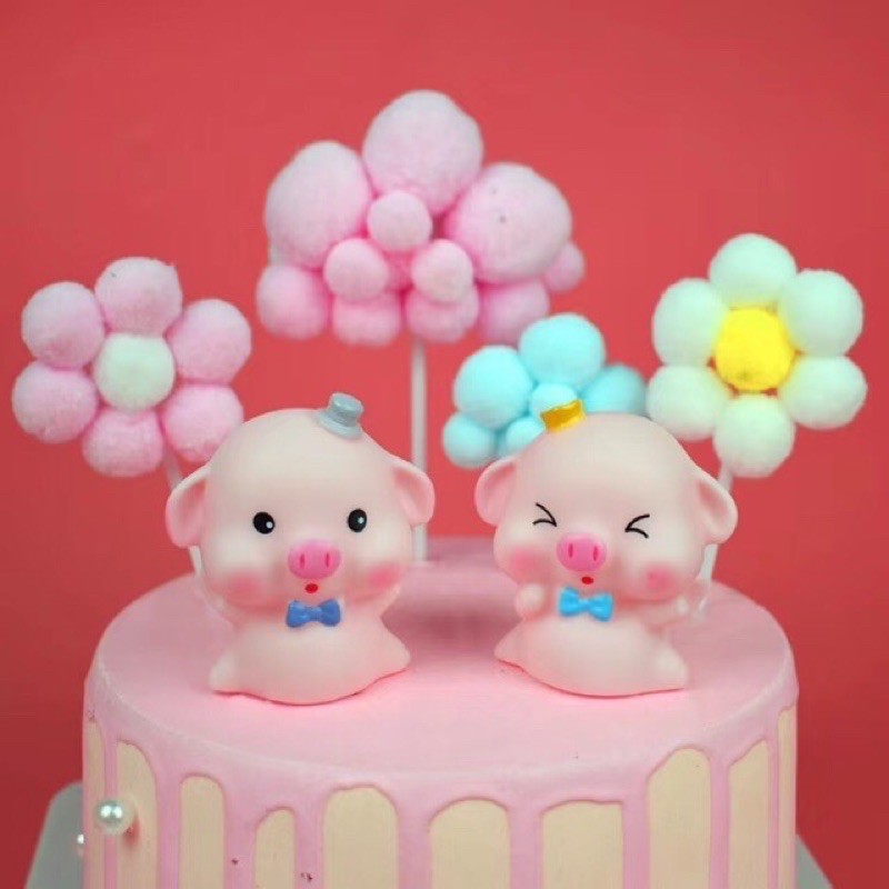 2 heo trang trí bánh