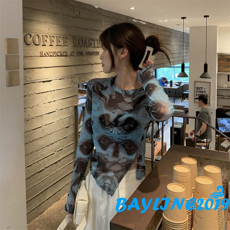 Áo dài tay thiết kế xẻ tà in họa tiết độc đáo thời trang cho nữ