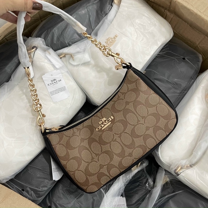 Túi coach dáng kẹp nách