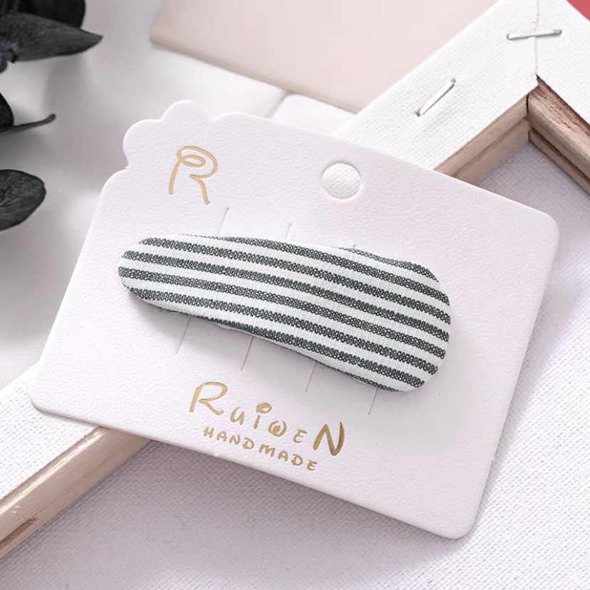 Kẹp tóc dài họa tiết chấm bi và kẻ cho bé gái