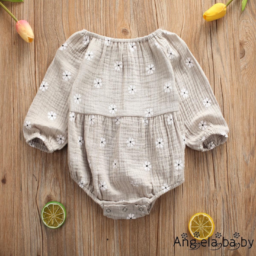 Áo liền quần in hoa cho bé