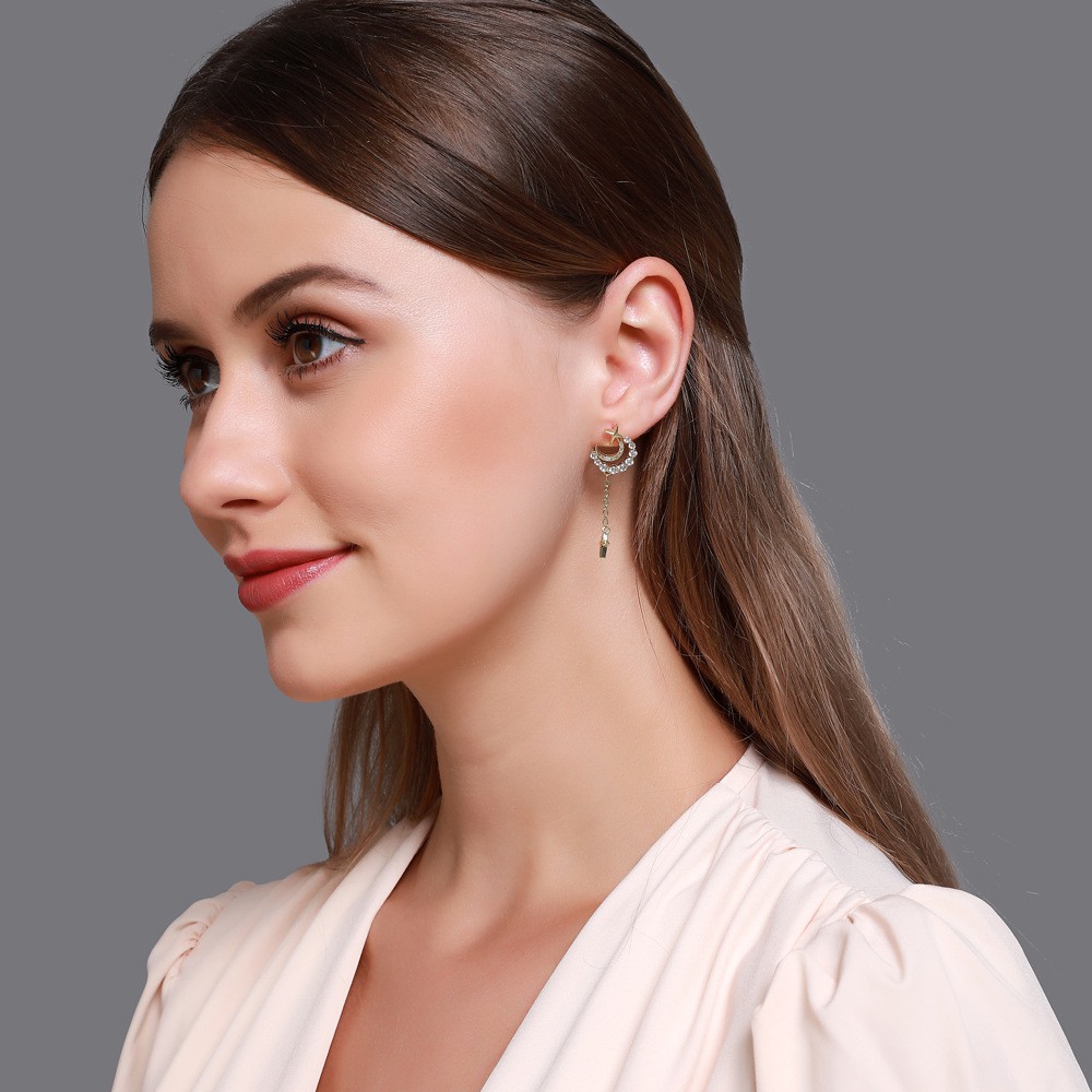 Moon And Star Shaped Metal Earrings With Diamonds