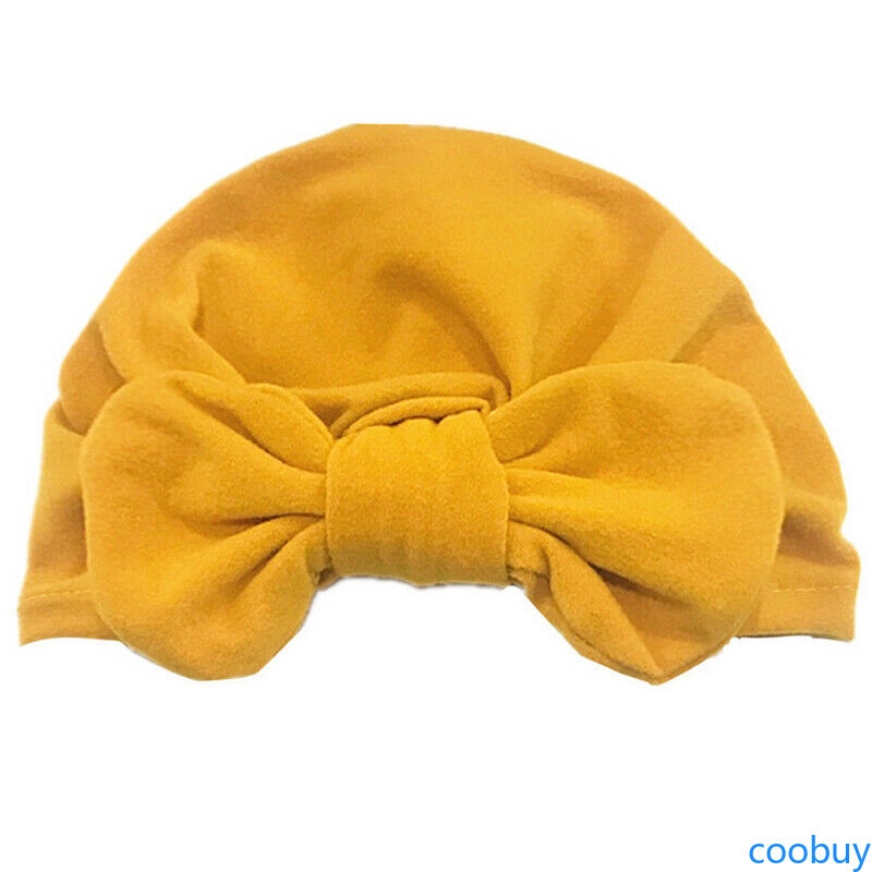 Mũ trùm đầu đính nơ đáng yêu cho bé