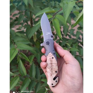 Dao gấp x50 cán bộc gỗ