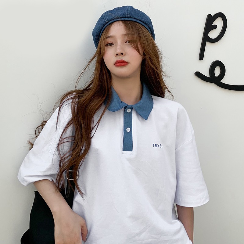 Áo polo phối cổ xanh
