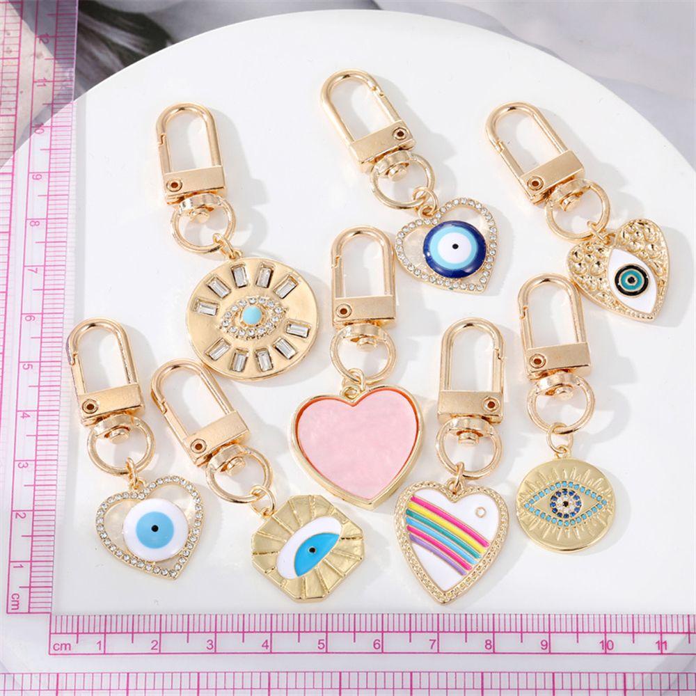 Móc Chìa Khóa Hình Trái Tim Lông Vũ Màu Cầu Vồng Phong Cách Vintage Dành Cho Cặp Đôi