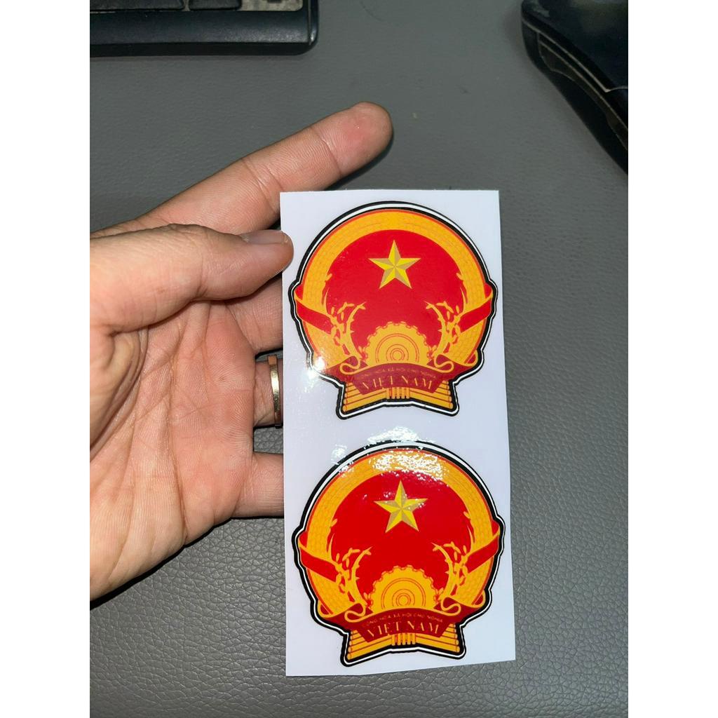 2 teem dán xe hình quốc huy