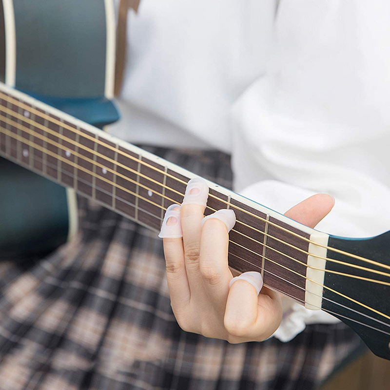Set 8 Miếng Silicon Bảo Vệ Ngón Tay Khi Chơi Đàn Guitar / Ukulele Màu Trong Suốt
