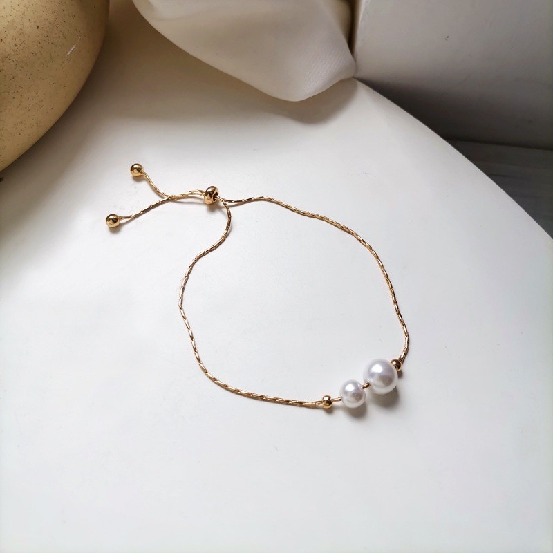 LT006 Lắc tay, Vòng tay titan, hợp kim cao cấp màu vàng Gold 2 trai dây rút (có thể điều chỉnh) Malisa Accessories