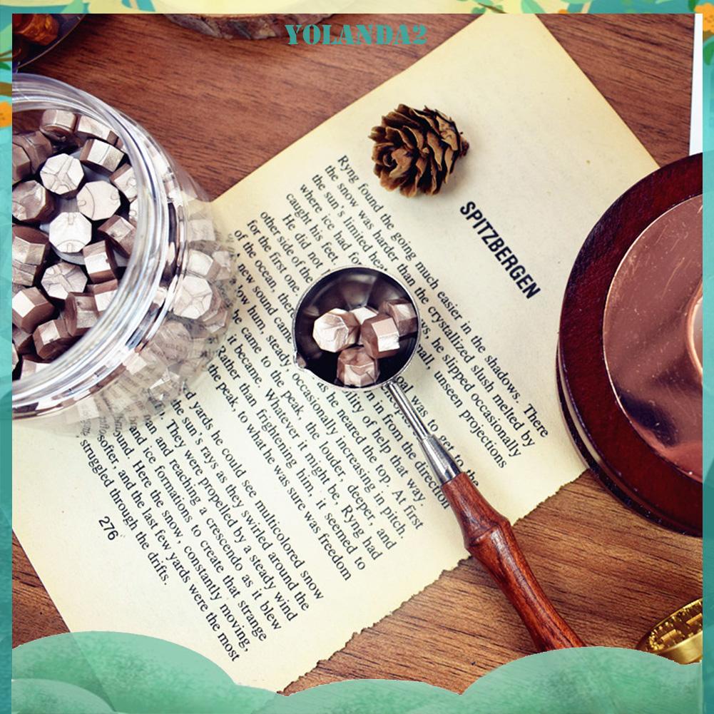 Muỗng nấu chảy sáp cán gỗ tiện dụng