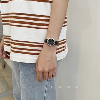 Đồng hồ dây da nữ Oega30 dây đen mặt đen viền bạc