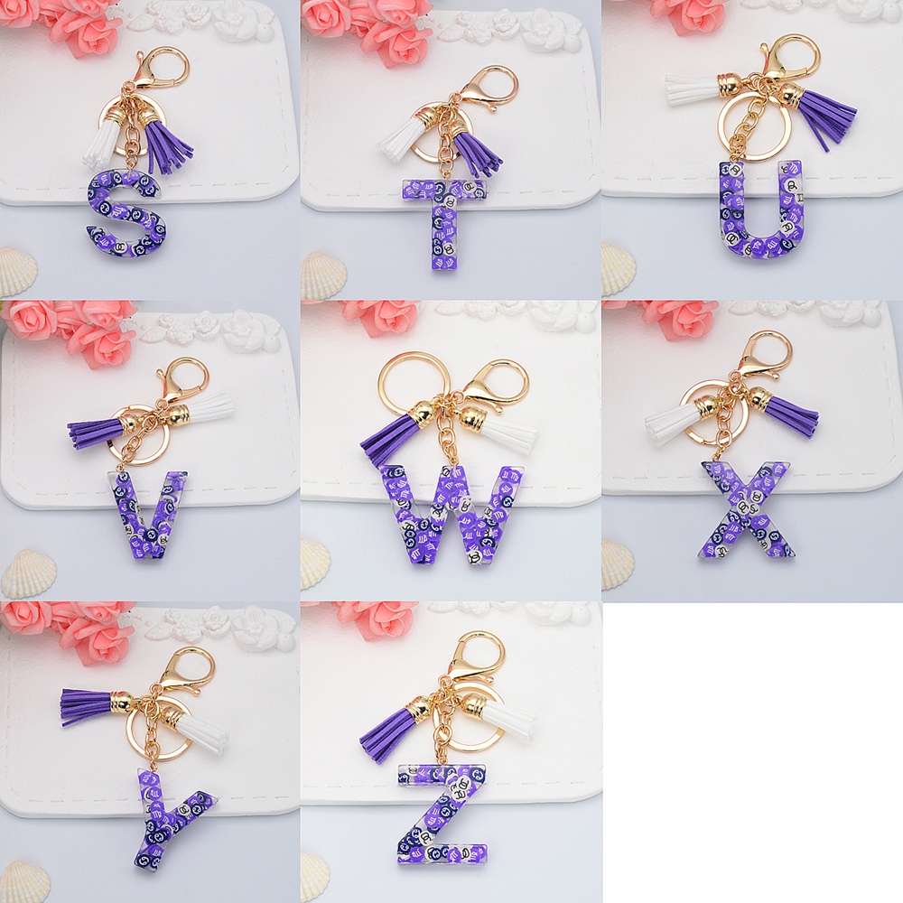 Móc Khóa 26 Chữ Cái Gắn Núm Tua Xinh Xắn Charms