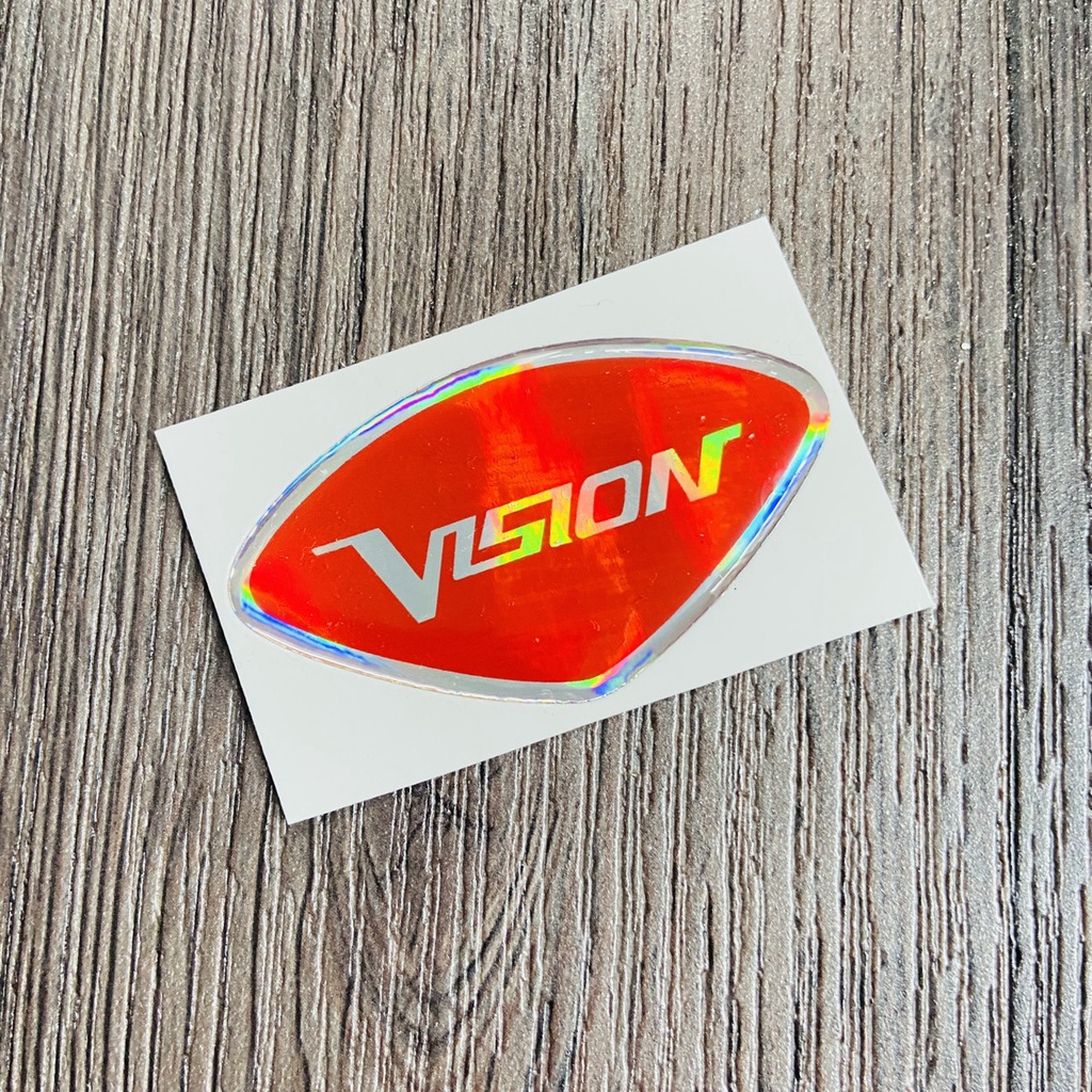 (TEM VISION) TEM LOGO VISION, tem phủ nhựa trong chữ VISION 2 màu lựa chọn