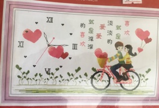 Tranh thêu đồng hồ