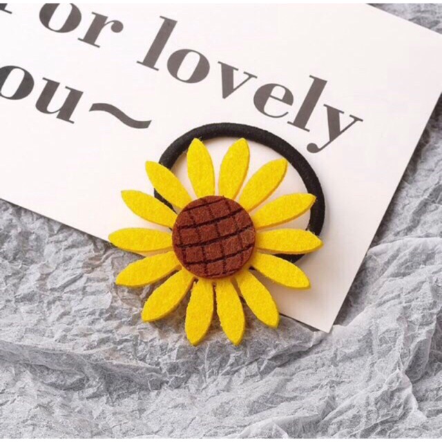 Cột tóc hoa hương dương to ( hình thật )