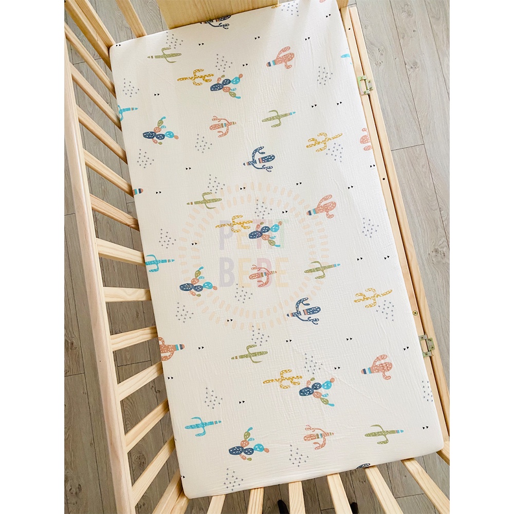 Ga bọc đệm cũi đa năng bo chun cho bé PETIT BEBE muslin 62x114cm họa tiết thiên nhiên