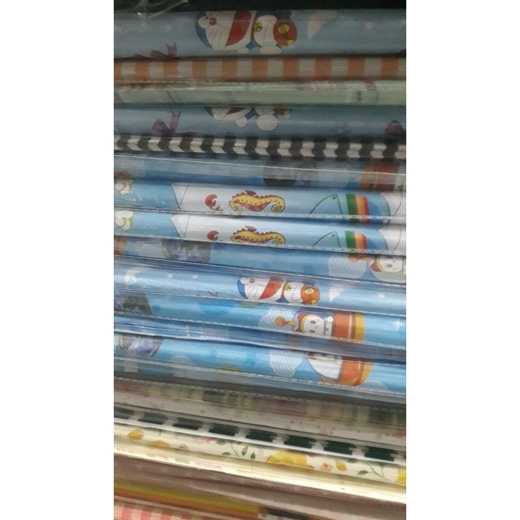 50 tờ giấy gói quà in hình 50x70cm kèm 50 nơ rút 50cm