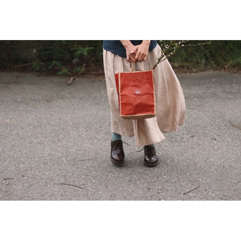 chân váy xếp ly lưng chun cài khuy lệch