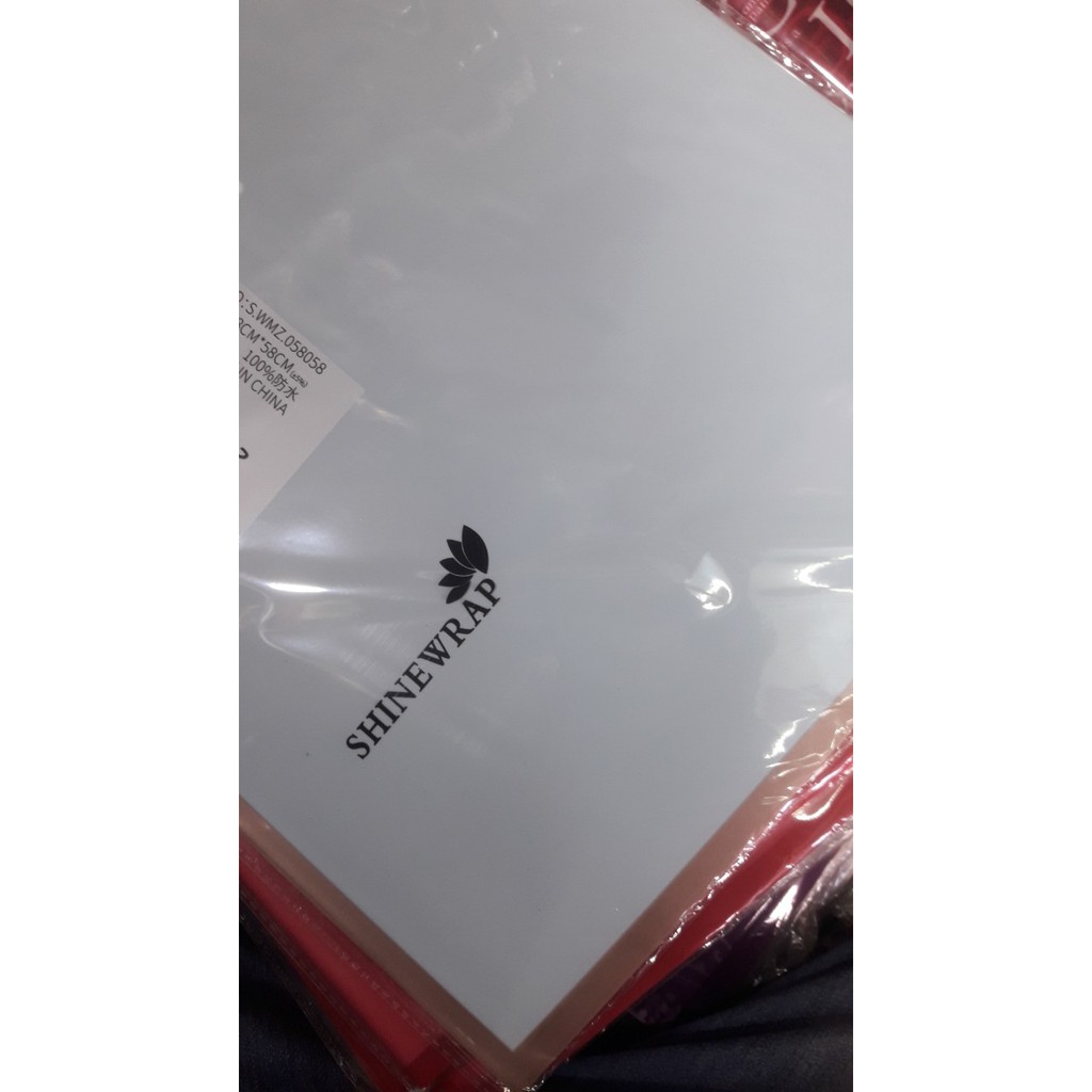 giấy kiếng mờ gói hoa xấp 20 tờ kèm 10 nơ rút