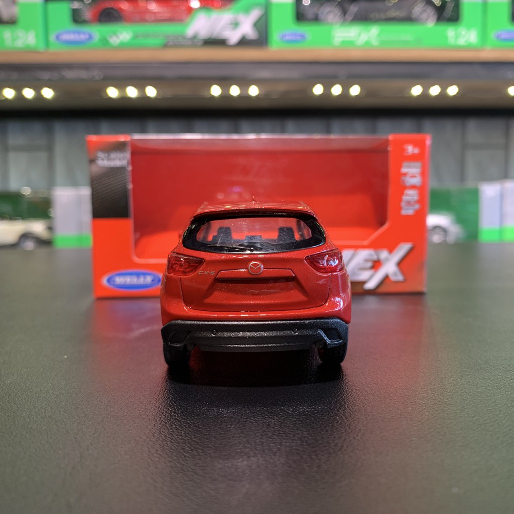 Mô hình xe ô tô Mazda Cx5 tỉ lệ 1:36 hãng Welly màu đỏ