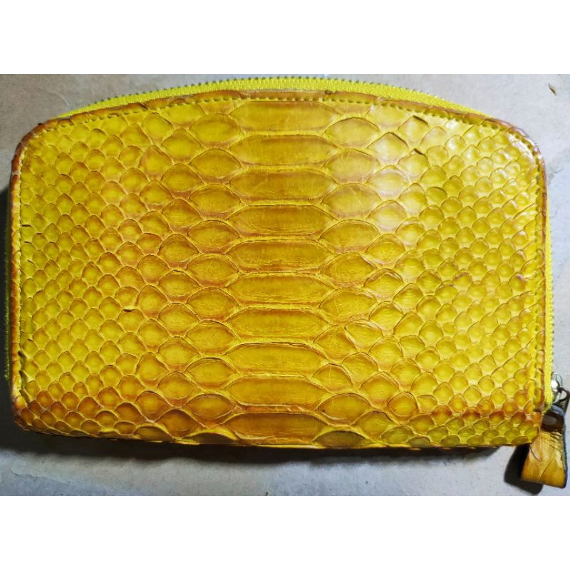 Ví cầm tay da t.r.ă.n